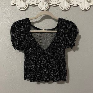 Shirt, LA HEARTS and the size is an XS